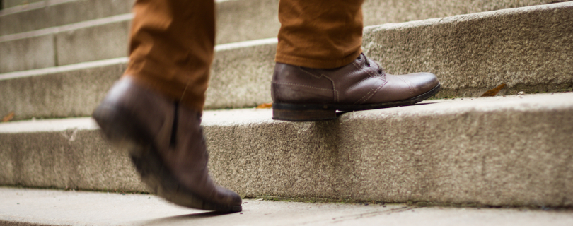 person walking up stairs