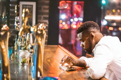 Man having a drink before driving